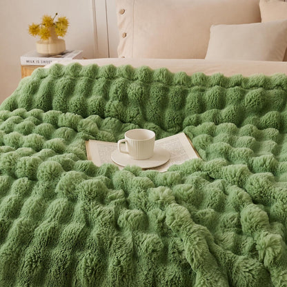 Heerlijk zachte, stijlvolle plaid die warmte, gezelligheid en elegantie samenbrengt.